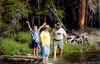 Michael having fun in the icy cold waters at Tuolumne Meadows , Yosemite